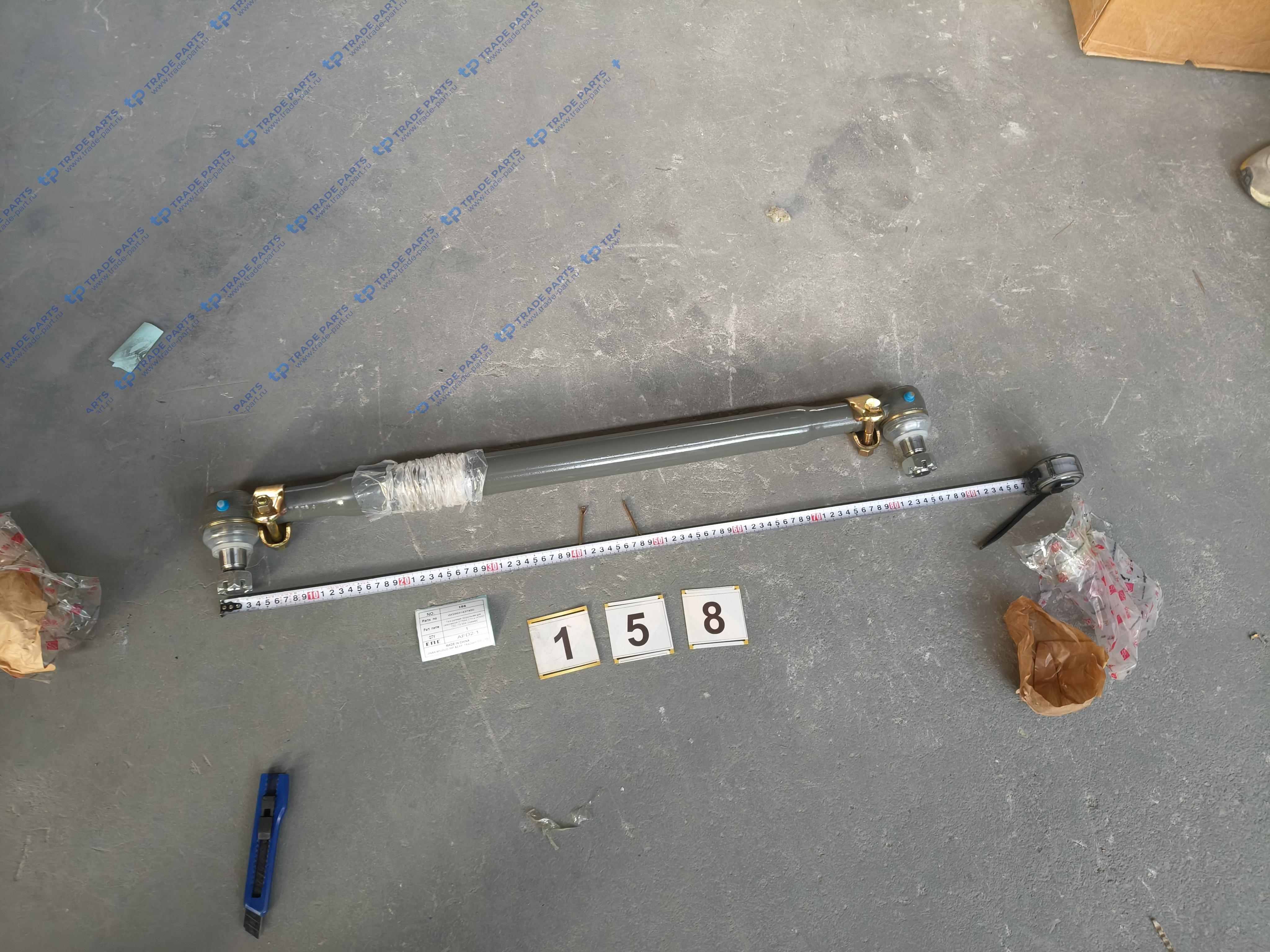 Реальная фотография тяга рулевая продольная для самосвалов sitrak c7h и howo t5g (tx 8x4) [прямая]