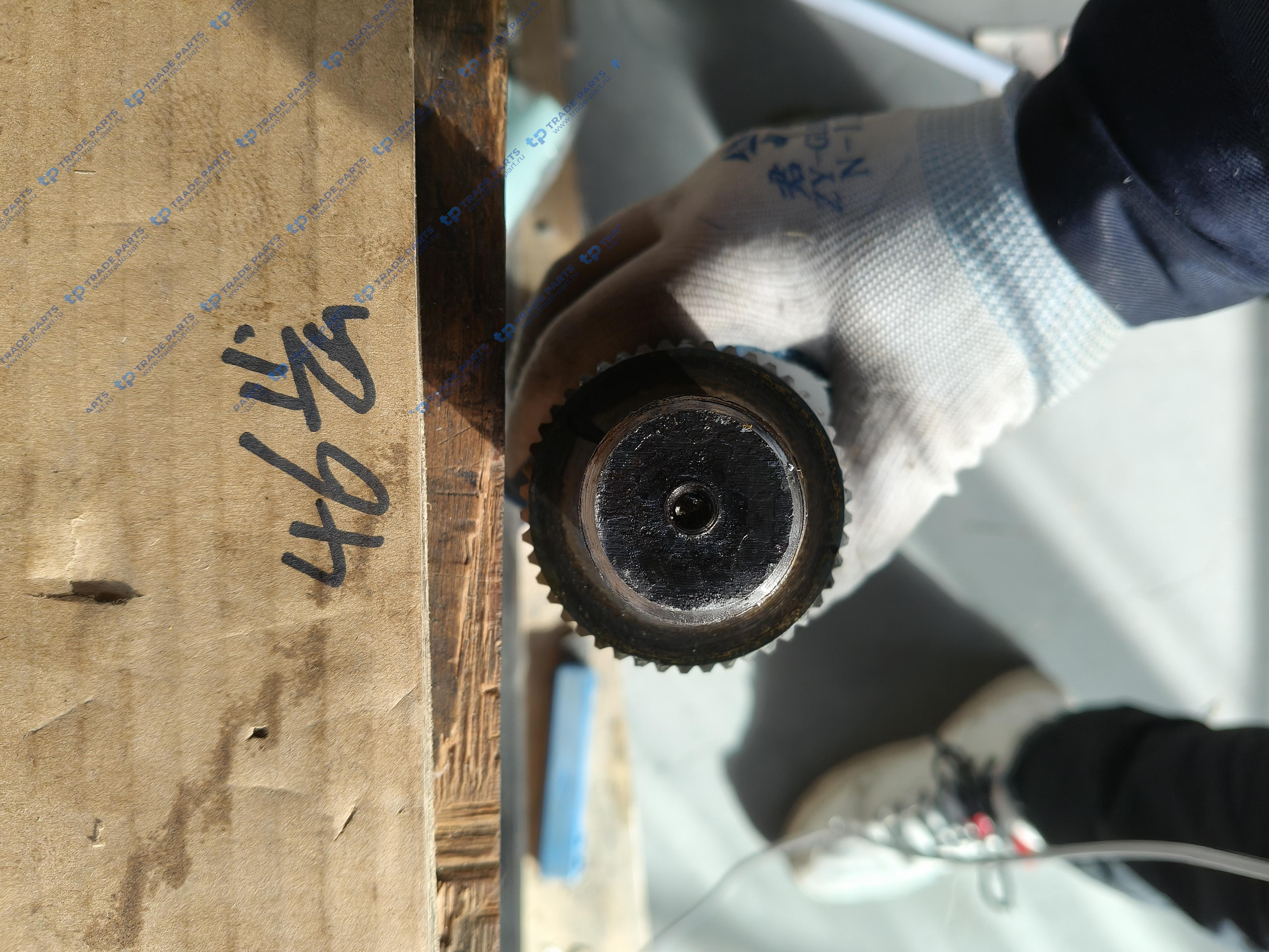 Реальная фотография вал проходной l=710 z=46