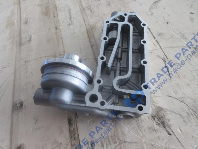 Реальная фотография головка масляного фильтра (кронштейн масляного фильтра)