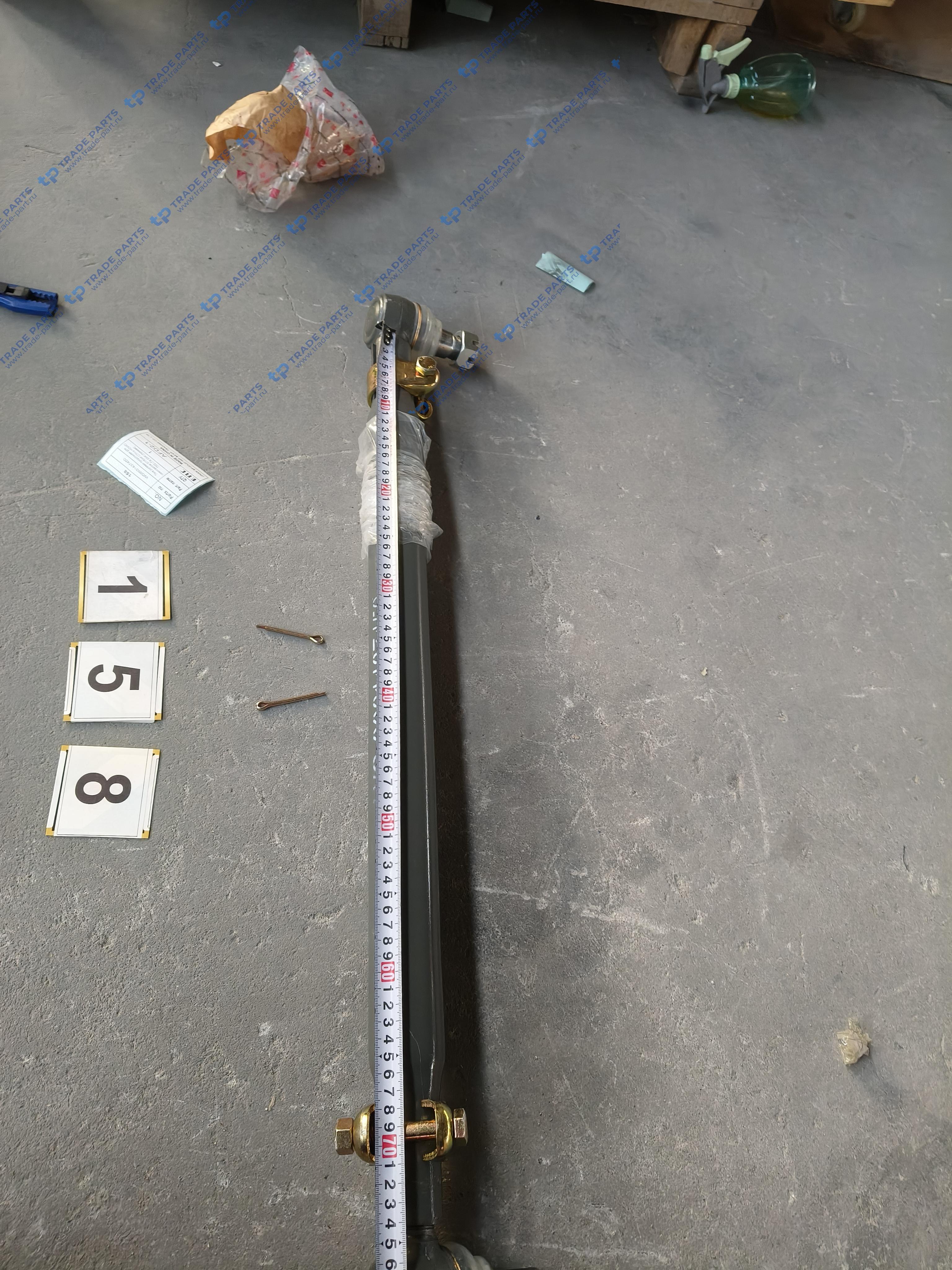 Реальная фотография тяга рулевая продольная для самосвалов sitrak c7h и howo t5g (tx 8x4) [прямая]