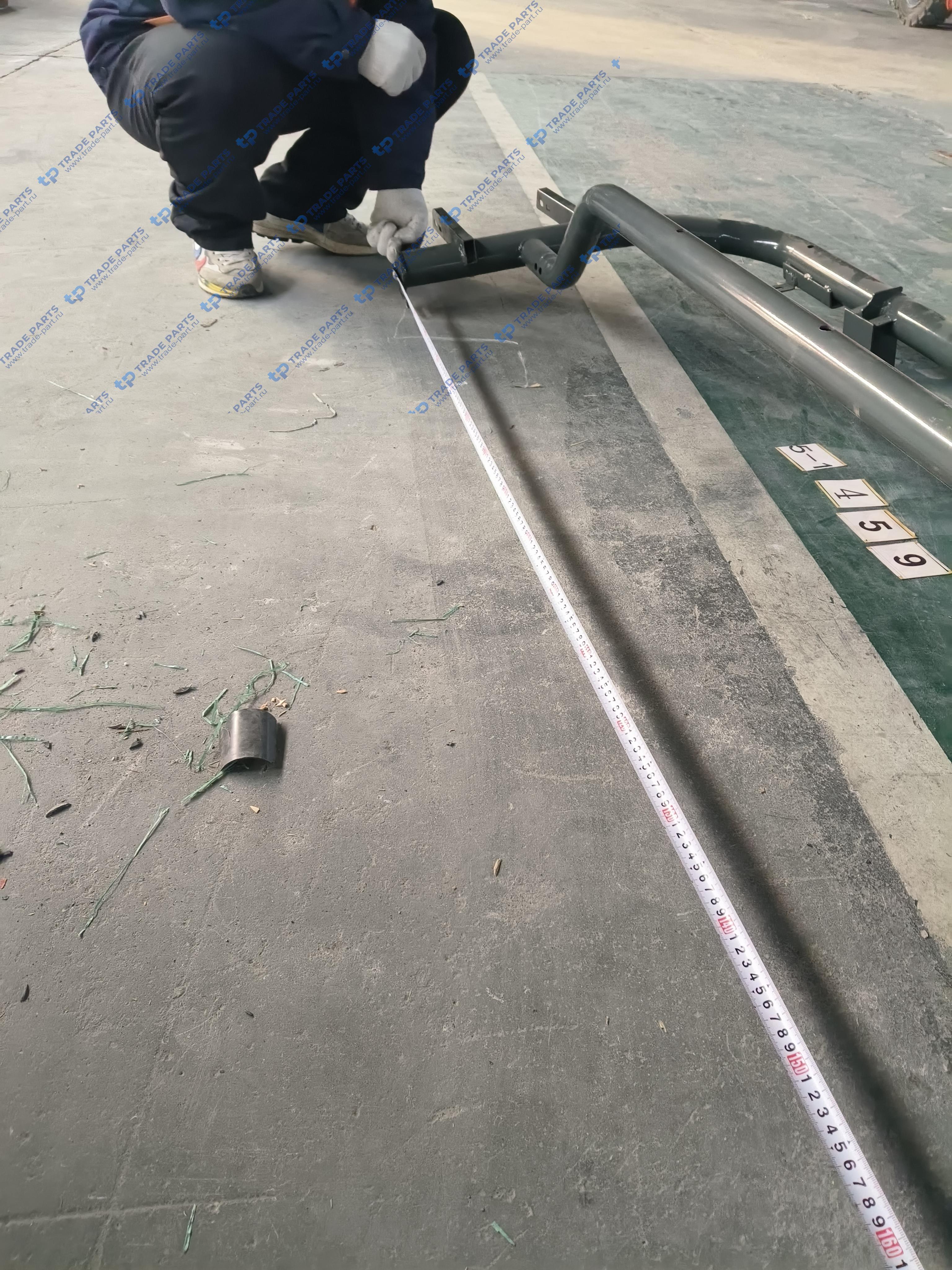 Реальная фотография кронштейн переднего бампера и подножек howo 2021