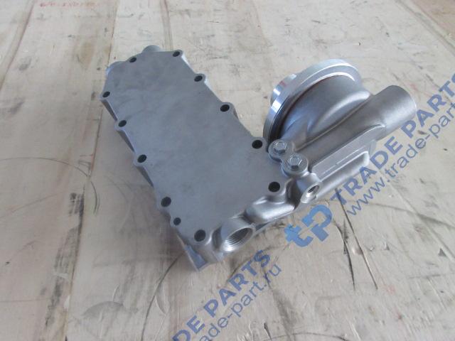 Реальная фотография головка масляного фильтра (кронштейн масляного фильтра)