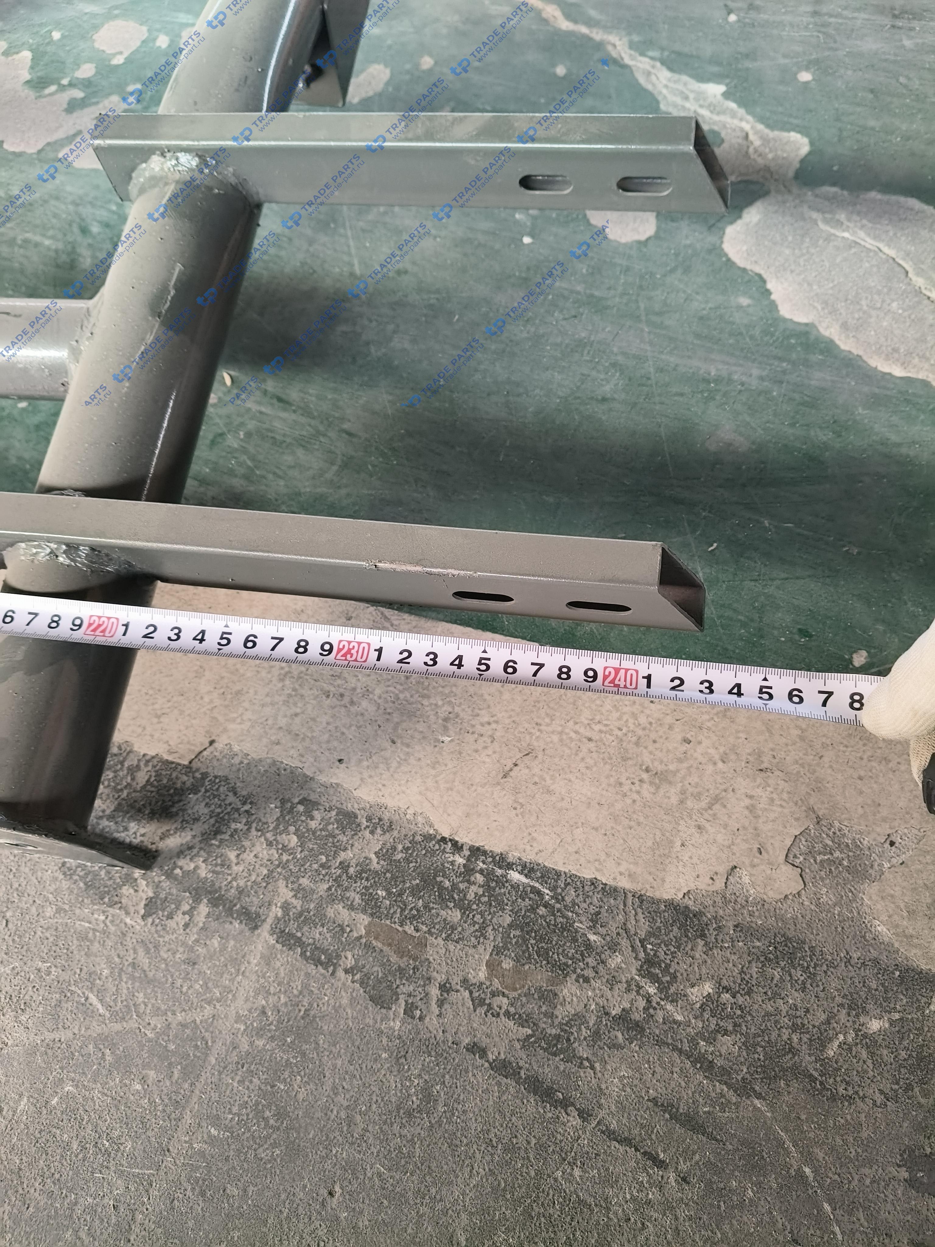 Реальная фотография кронштейн переднего бампера и подножек howo 2021